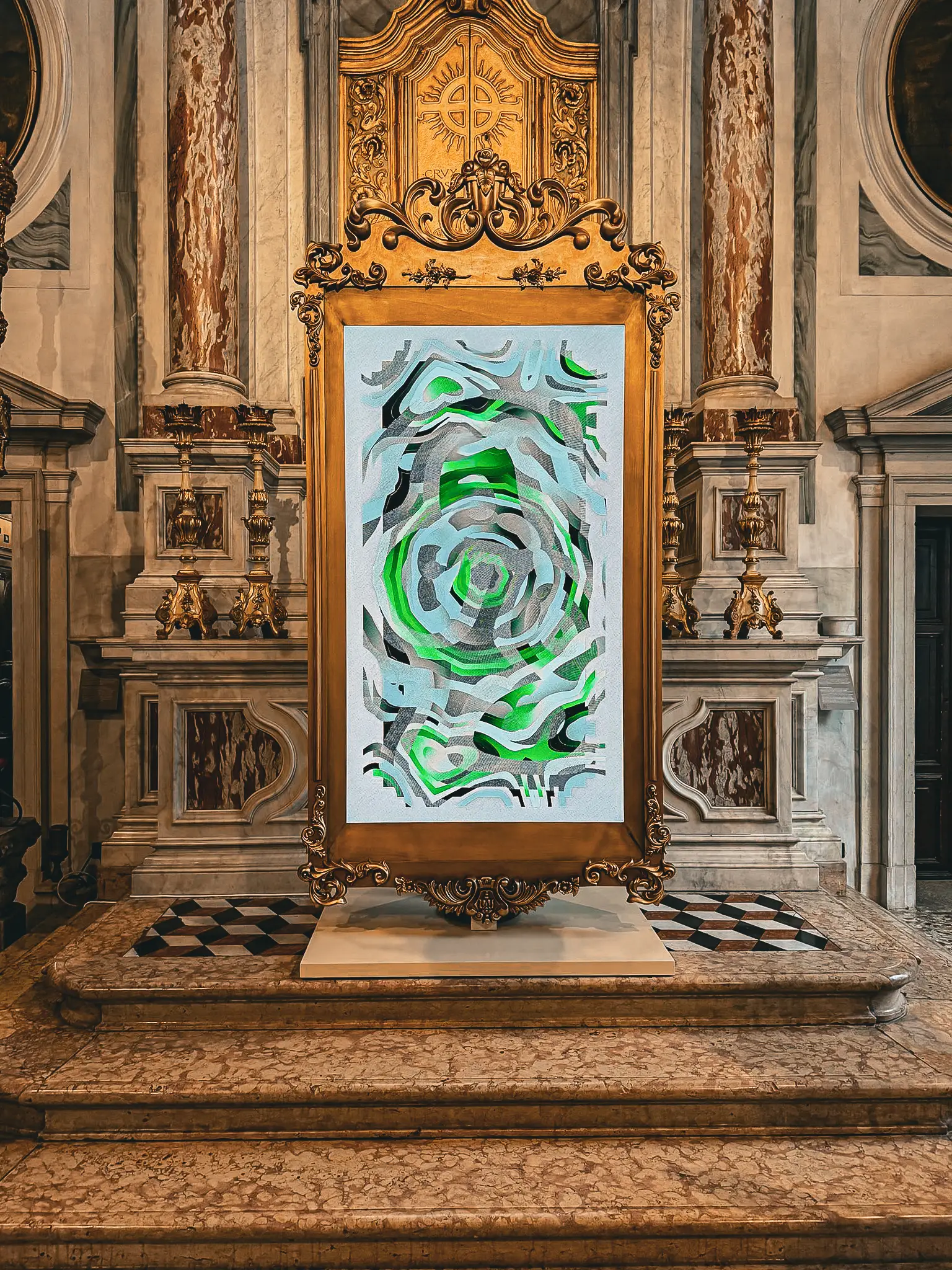 Artwork on a screen set in a gilded frame before a church altar, Bright Moments Venice.